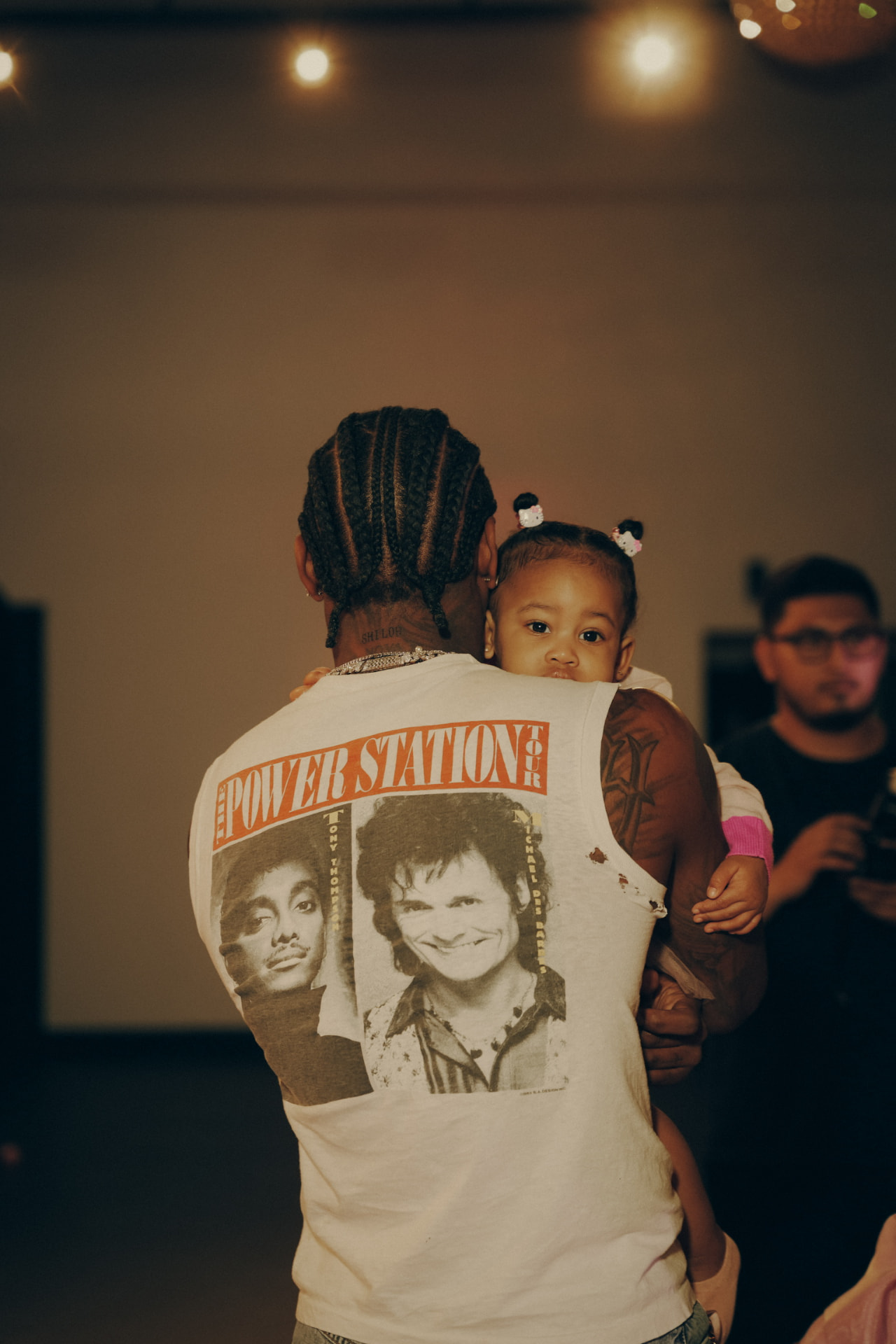 Father and daughter at a family celebration