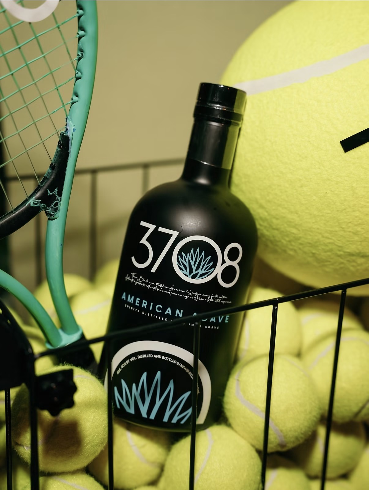 3708 American Agave bottle styled with tennis balls