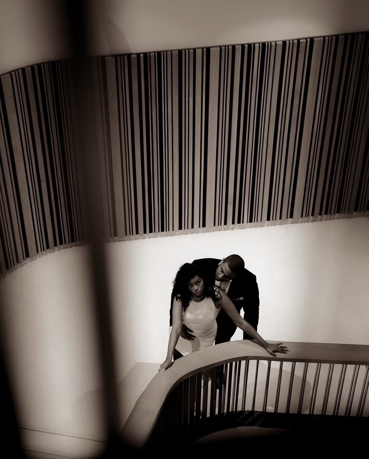 Couple on a sculptural staircase