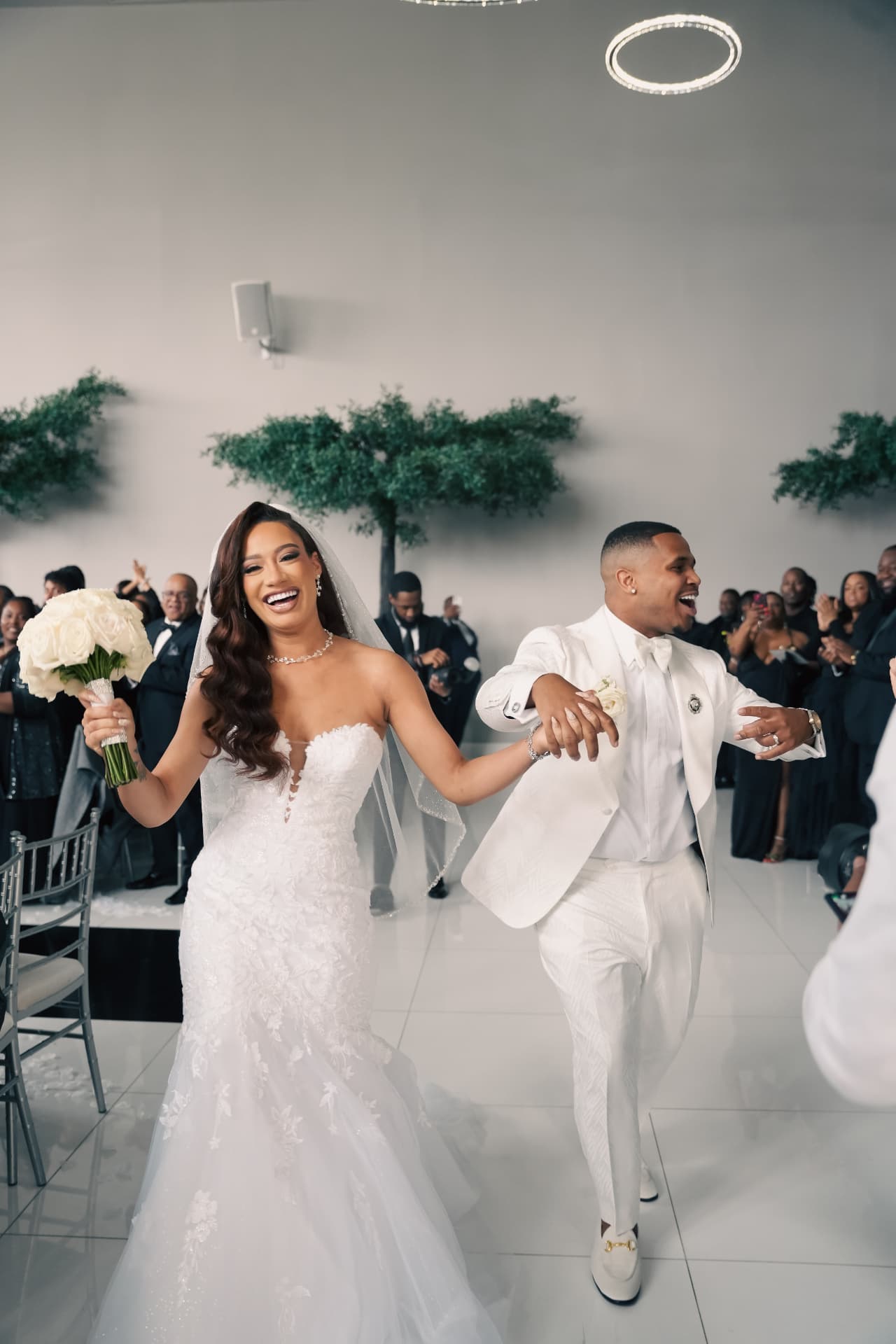 Joyful bride and groom recessional
